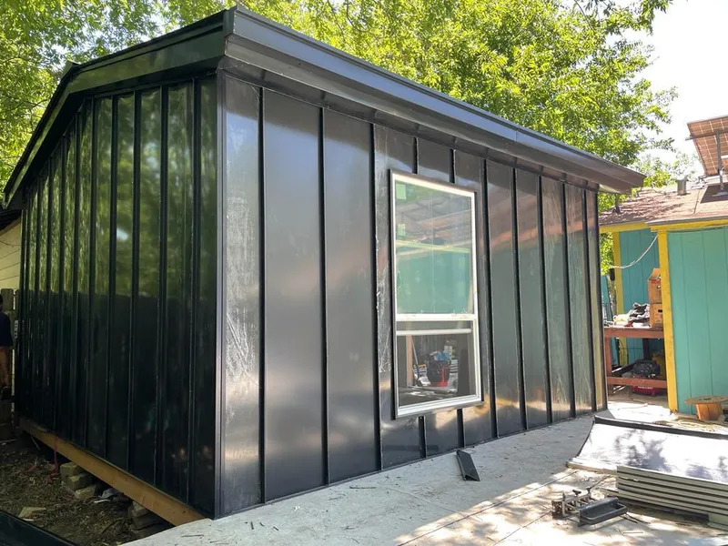 Black standing seam metal wall panels for Roof Inspection in Hope