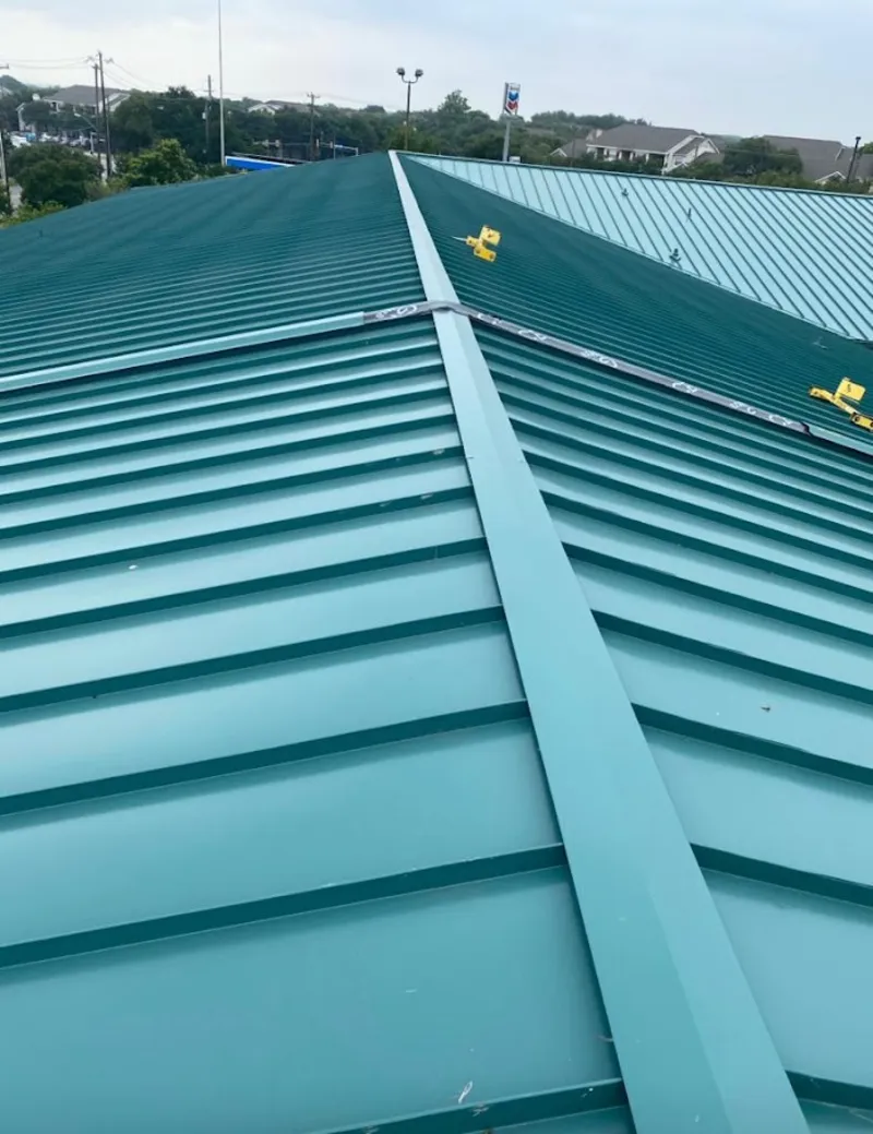Green commercial metal roof ridge and valley for Metal Roof Repair in Hope